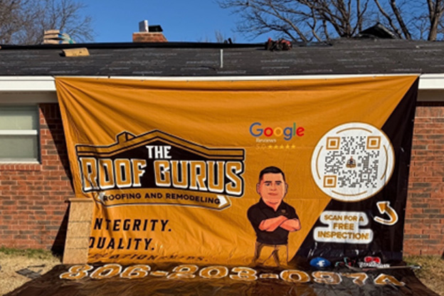 Home covered with tarp during roof repair planning